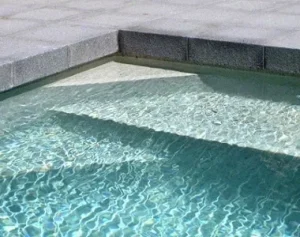 Raven Grey Granite Drop Face Pool Coping Tiles And Pavers, Black Pool Coping Tiles, Dark Pool Coping Tiles By Stone Pavers Melbourne, Sydney Brisbane Canberra Adelaide